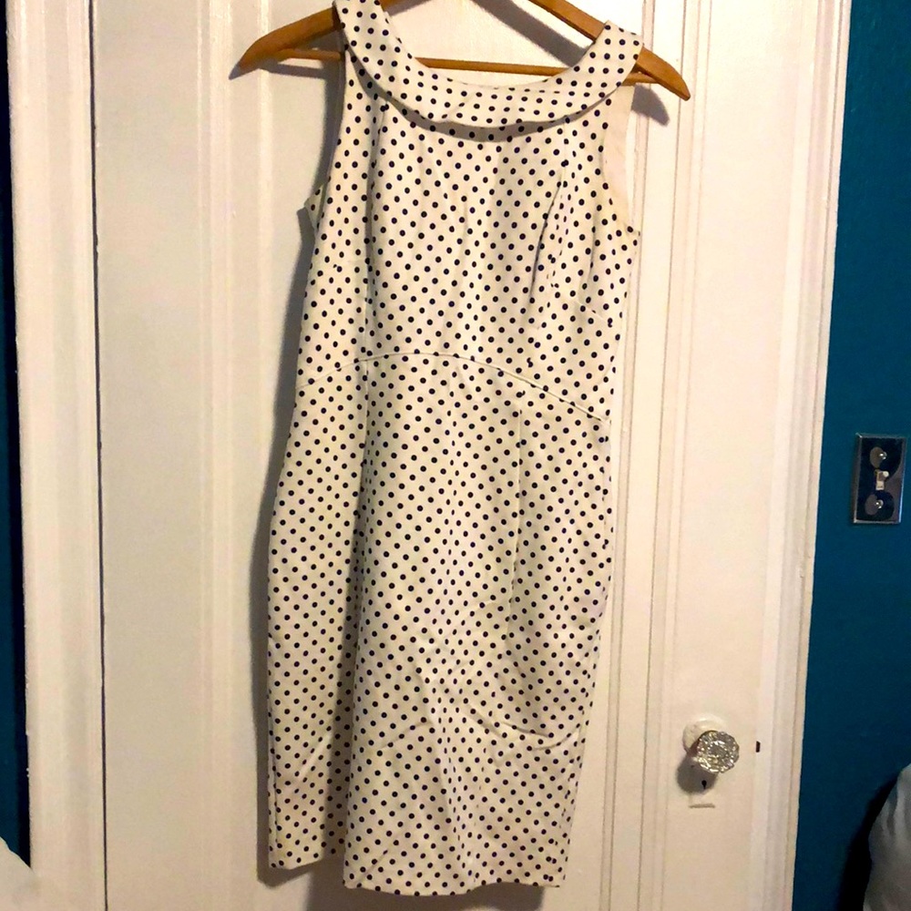 Sleeveless navy white polka dot dress